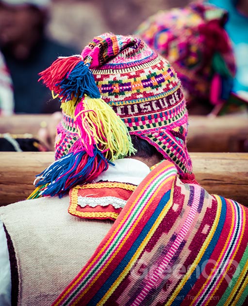 Peru Tours - Indigenous man with colorful clothing Peru Tours - Indigenous man with colorful clothing